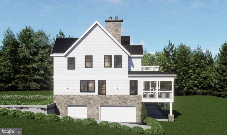 290 Carrs Bridge Road Mineral, VA 23117 - Photo 11 of 101 a view of a yard in front of a house with plants