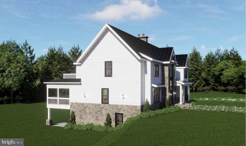 290 Carrs Bridge Road Mineral, VA 23117 - Photo 15 of 101 a view of a yard in front of a house with plants and large tree