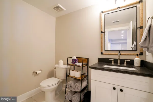 a bedroom with two beds and a window