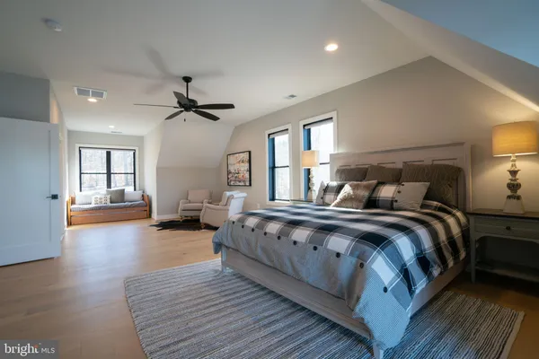 a large kitchen with lots of counter top space and stainless steel appliances