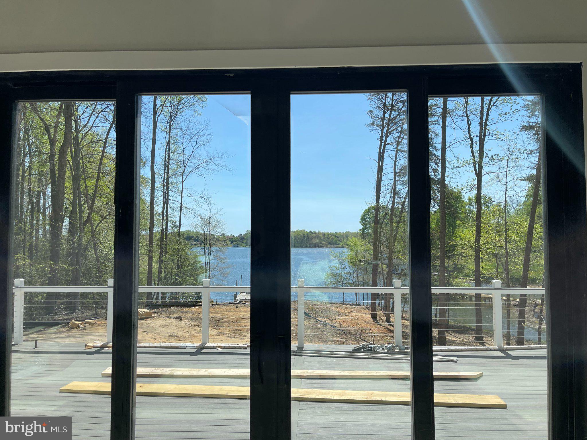 290 Carrs Bridge Road Mineral, VA 23117 - Photo 36 of 38 a view of a glass door and the porch with a floor to ceiling window