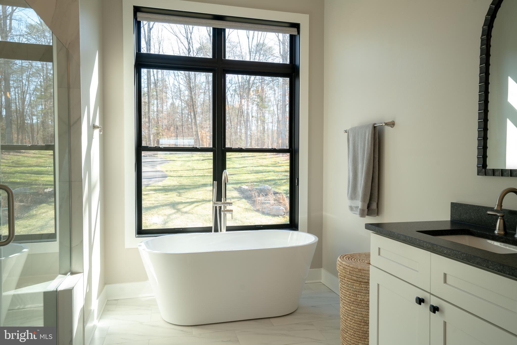 290 Carrs Bridge Road Mineral, VA 23117 - Photo 82 of 101 a living room with a large window and a wooden floor