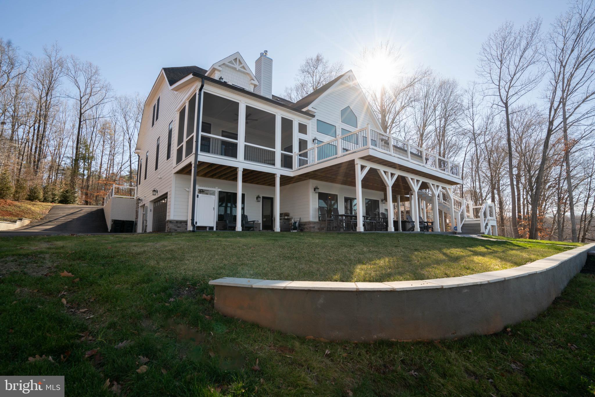 290 Carrs Bridge Road Mineral, VA 23117 - Photo 88 of 101 a view of a house with a yard and sitting area