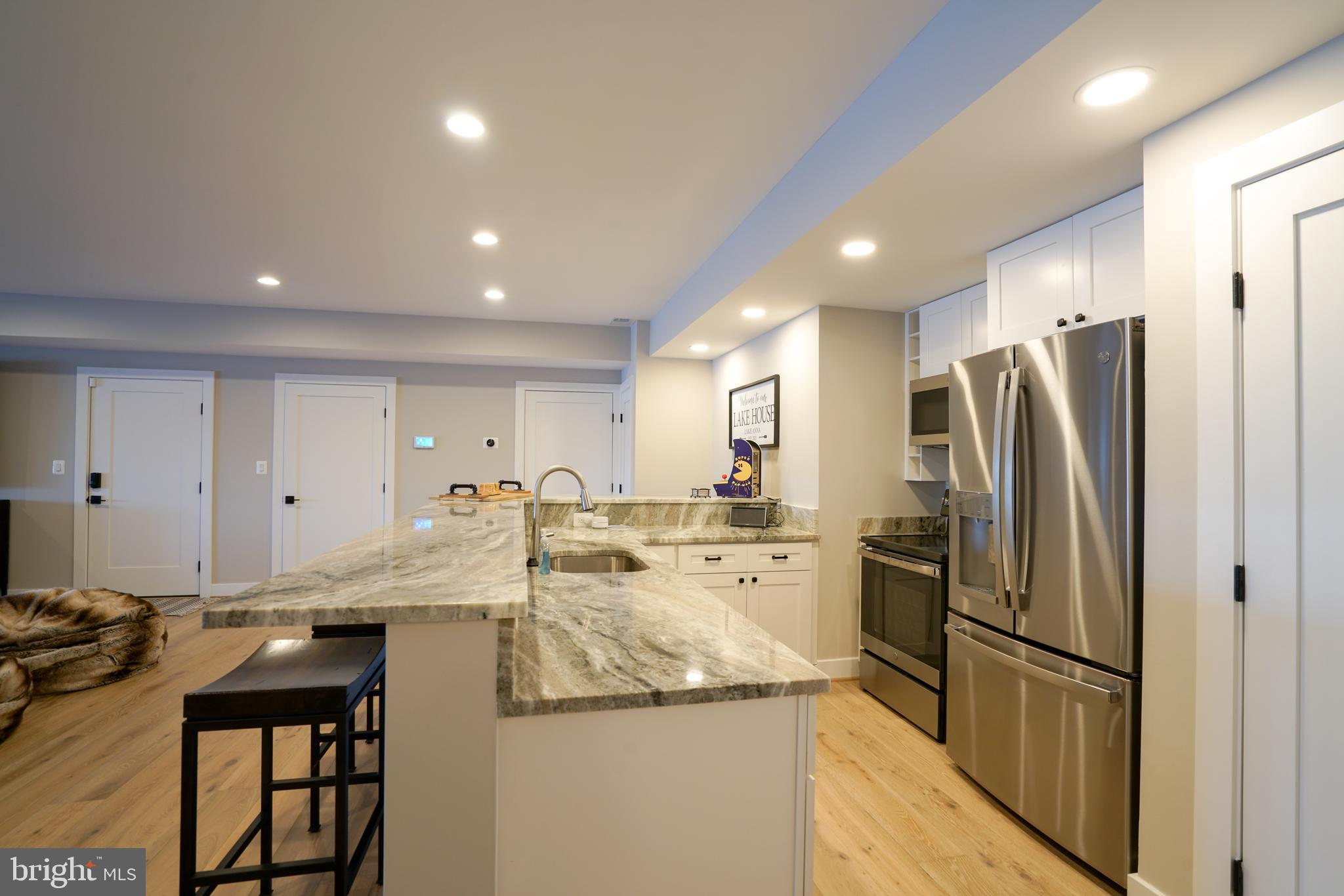 290 Carrs Bridge Road Mineral, VA 23117 - Photo 100 of 101 a kitchen with stainless steel appliances granite countertop a refrigerator and a stove top oven