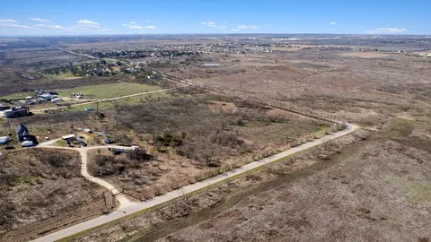 a view of an ocean beach and mountain