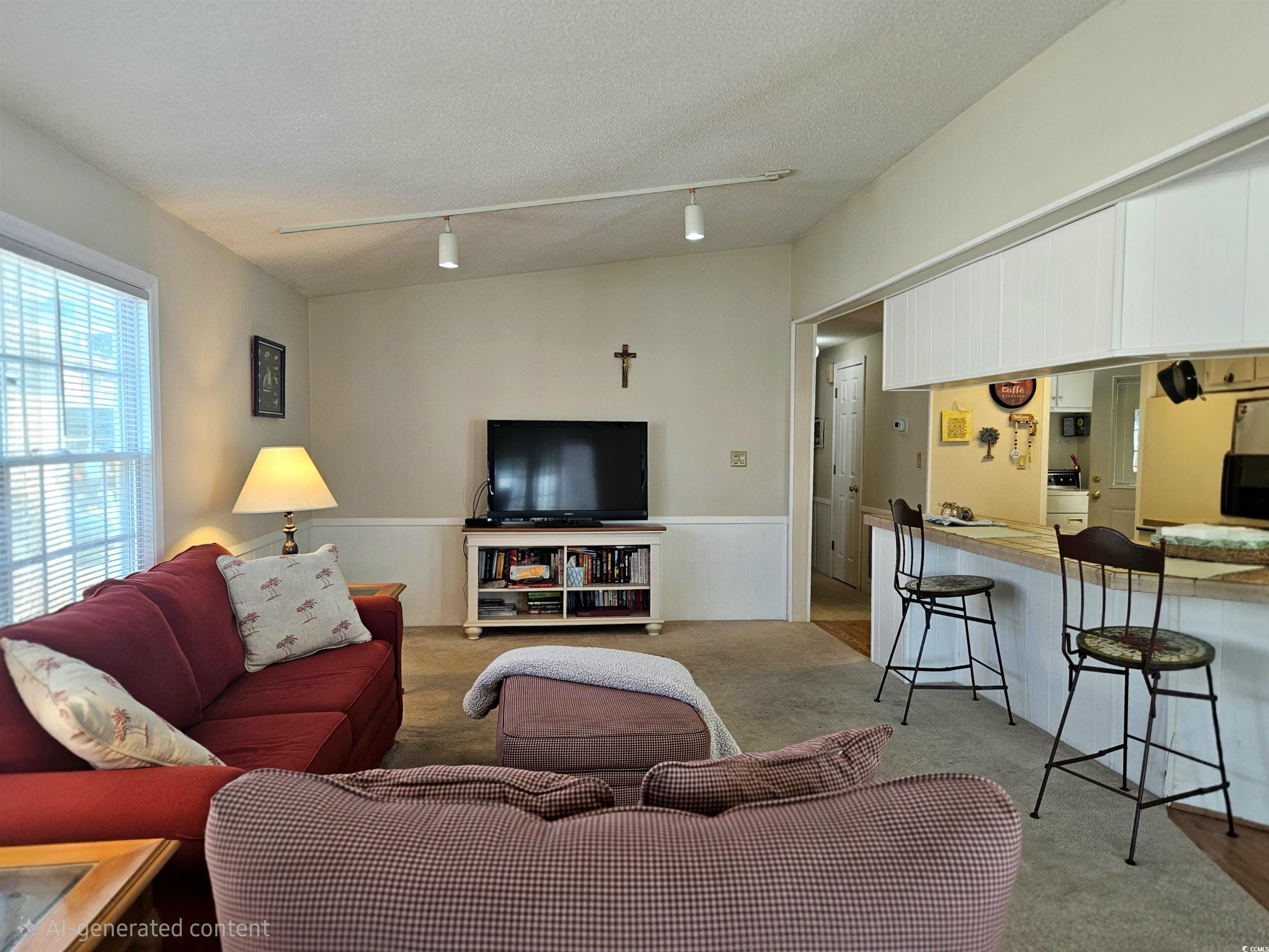 471 Meadowlark Surfside Beach, SC 29575 - Photo 16 of 40 Carpeted living room with vaulted ceiling, rail lighting, a textured ceiling, and washer / clothes dryer