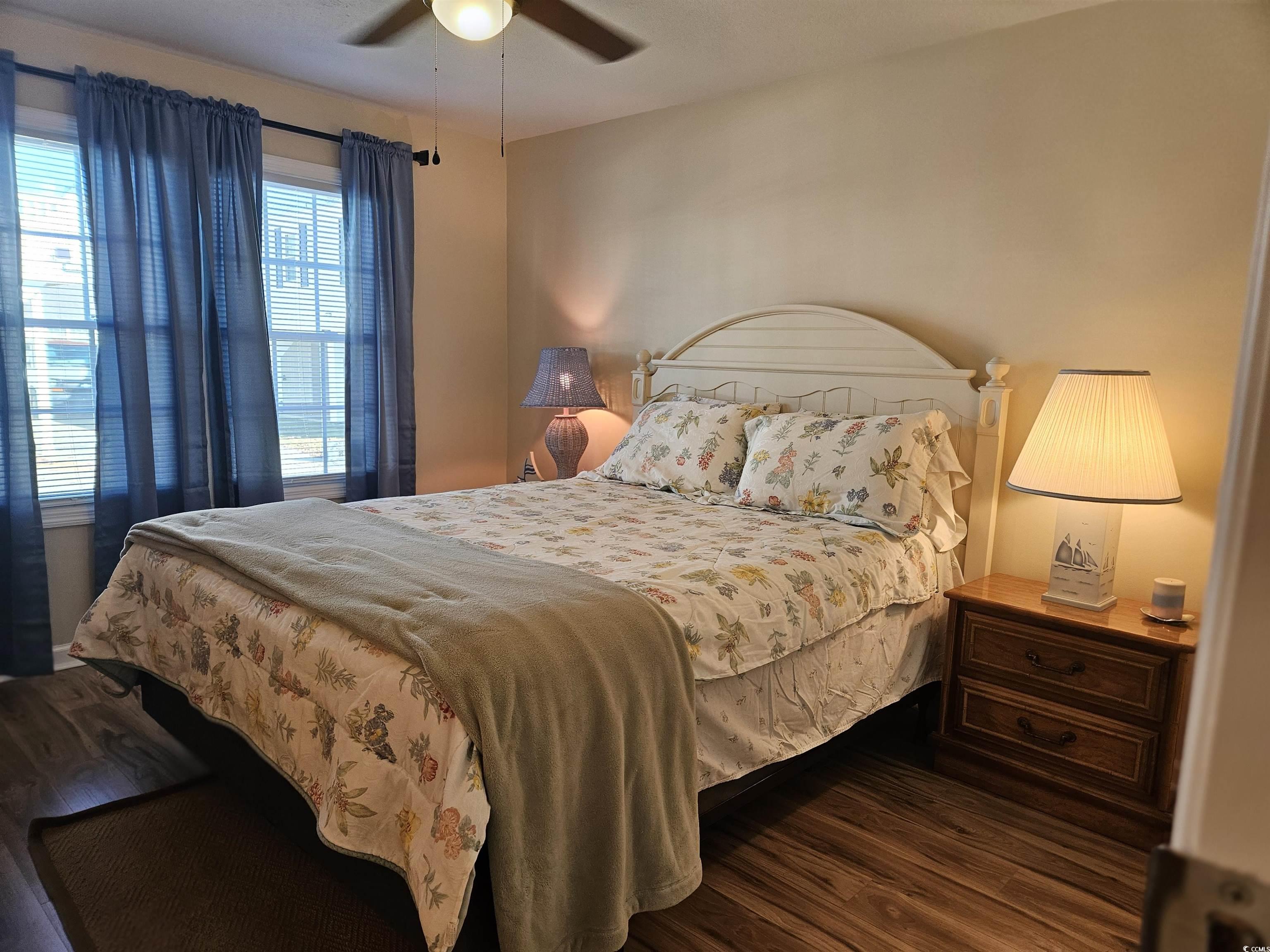471 Meadowlark Surfside Beach, SC 29575 - Photo 20 of 40 Bedroom featuring dark wood-type flooring and a ceiling fan