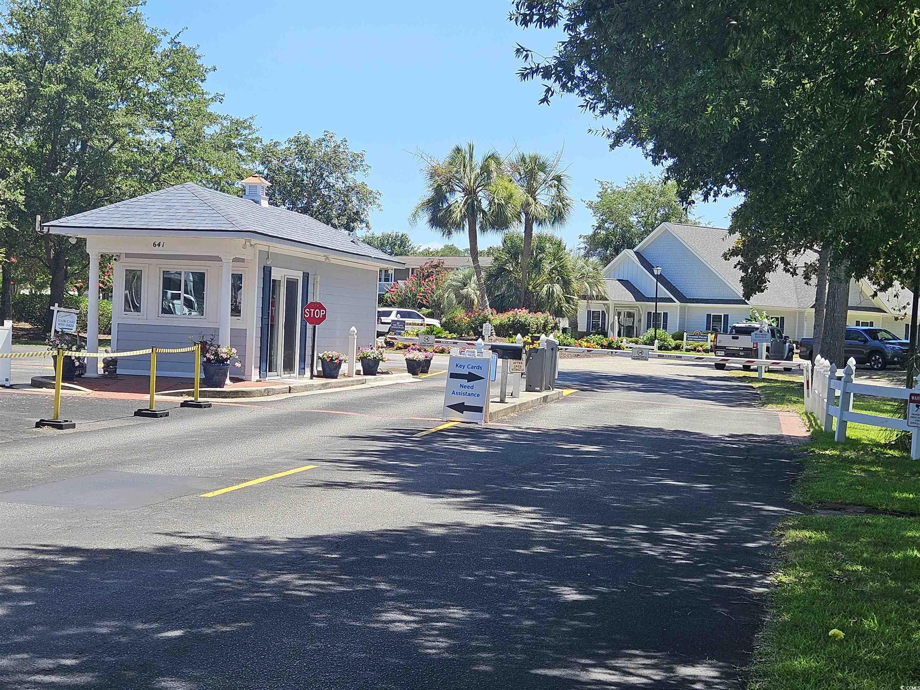 471 Meadowlark Surfside Beach, SC 29575 - Photo 28 of 40 View of asphalt street featuring traffic signs