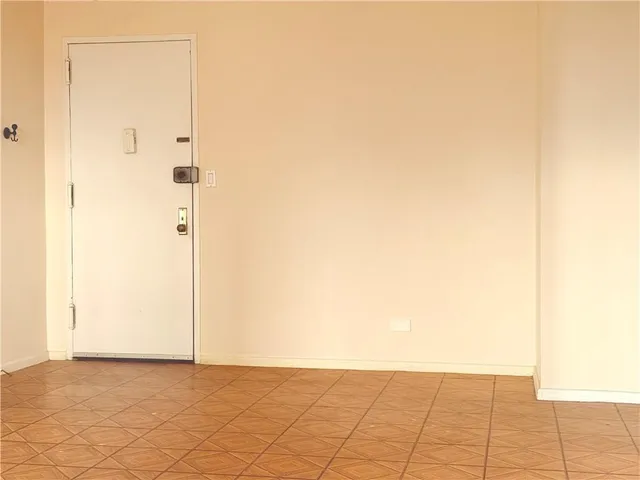 a view of a room with a rug