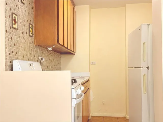 a utility room with a window dryer and washer