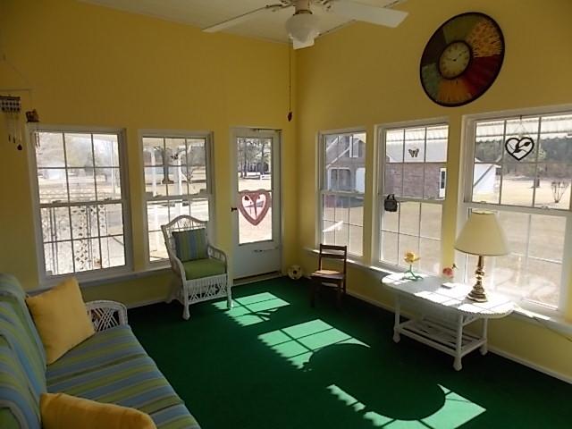 349 Duncan Chapel Road Harleyville, SC 29448 - Photo 27 of 30 SUN ROOM (12'x16') ACCESS FROM KITCHEN