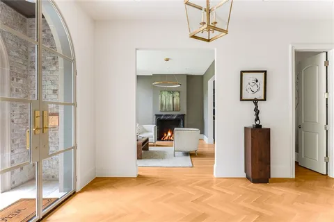 a view of a livingroom with furniture and cabinet