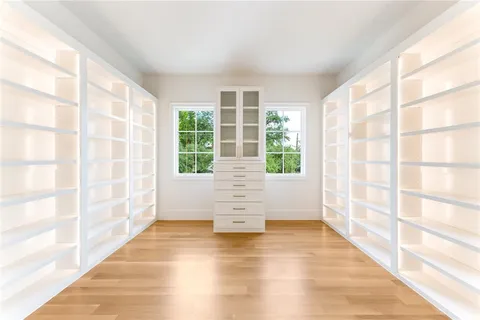 a view of empty room with windows