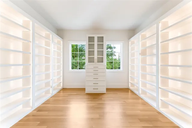 a view of empty room with windows