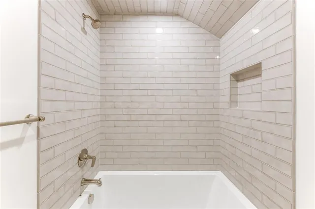 a bathroom with a bathtub