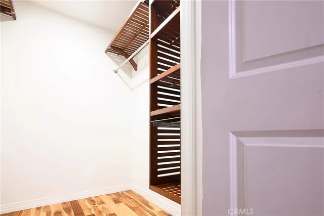 a view of a hallway with stairs