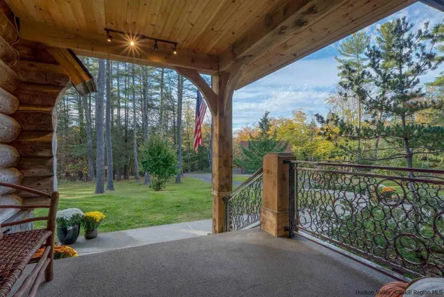 a view of a porch with a yard