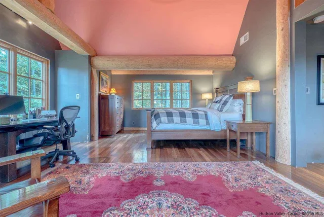 a white bath tub sitting next to a window