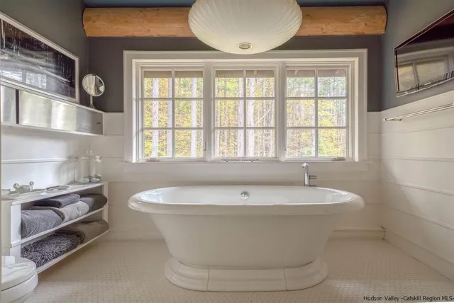 a bathroom with a sink and a bathtub