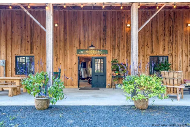 a view of a entryway with flower pots