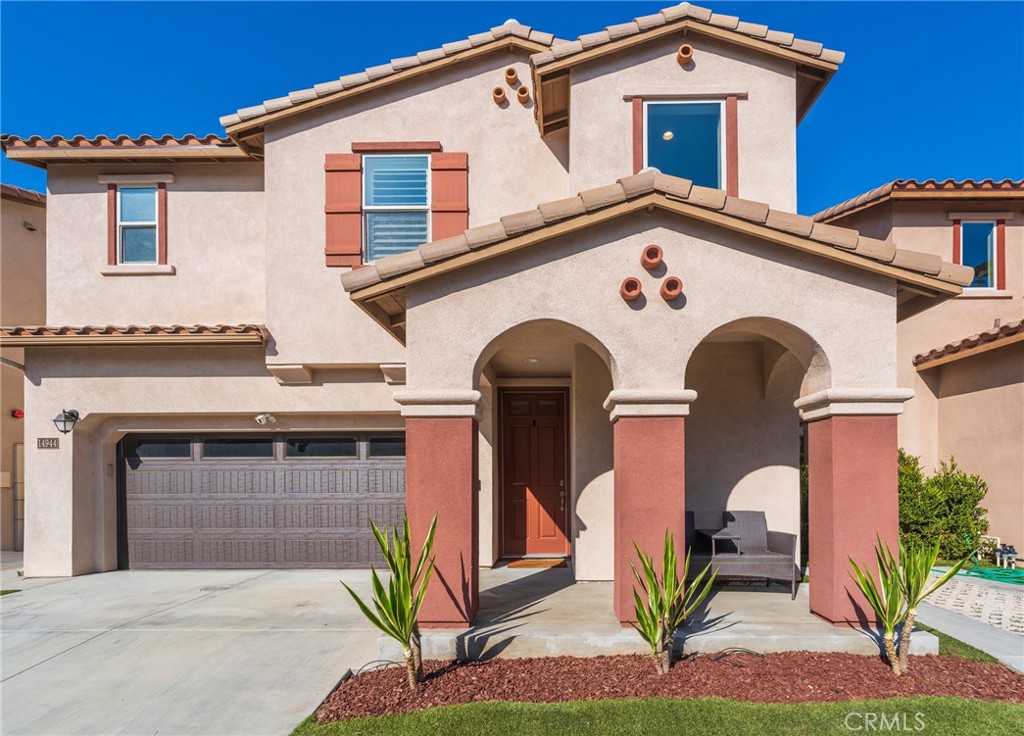 14944 Texaco Avenue Paramount, CA 90723 - Photo 1 of 25 Charming curb appeal with well-maintained landscaping and attached 2-car garage