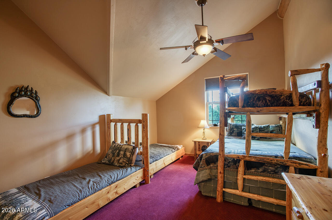 13090 Ghost Train Trail Parks, AZ 86046 - Photo 12 of 23 a view of a room with gym equipment