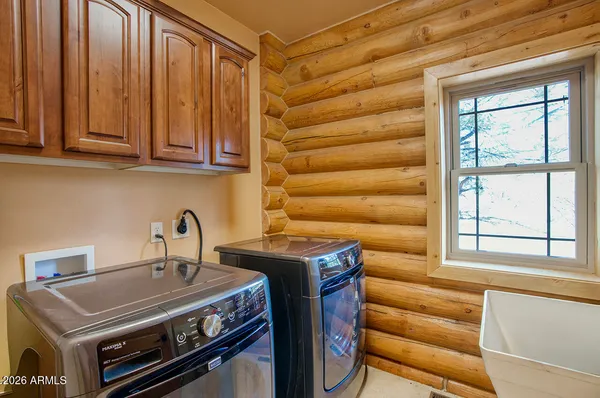 a kitchen with a stove and a sink