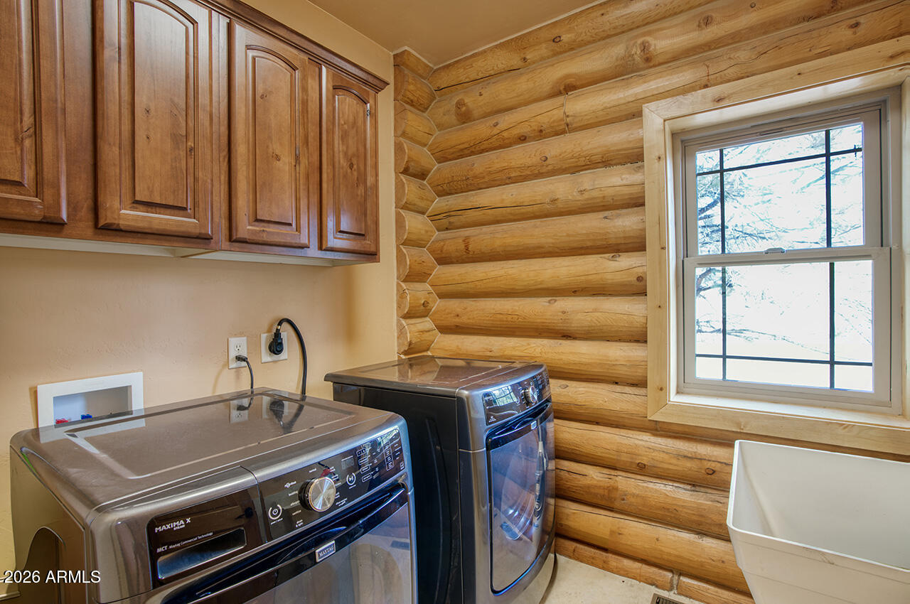13090 Ghost Train Trail Parks, AZ 86046 - Photo 16 of 23 a kitchen with a stove and a sink