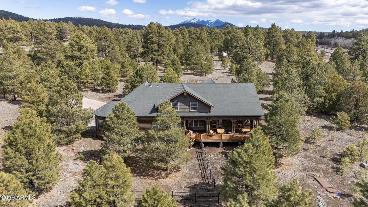 13090 Ghost Train Trail Parks, AZ 86046 - Photo 19 of 23 an aerial view of a house with a yard and lake view