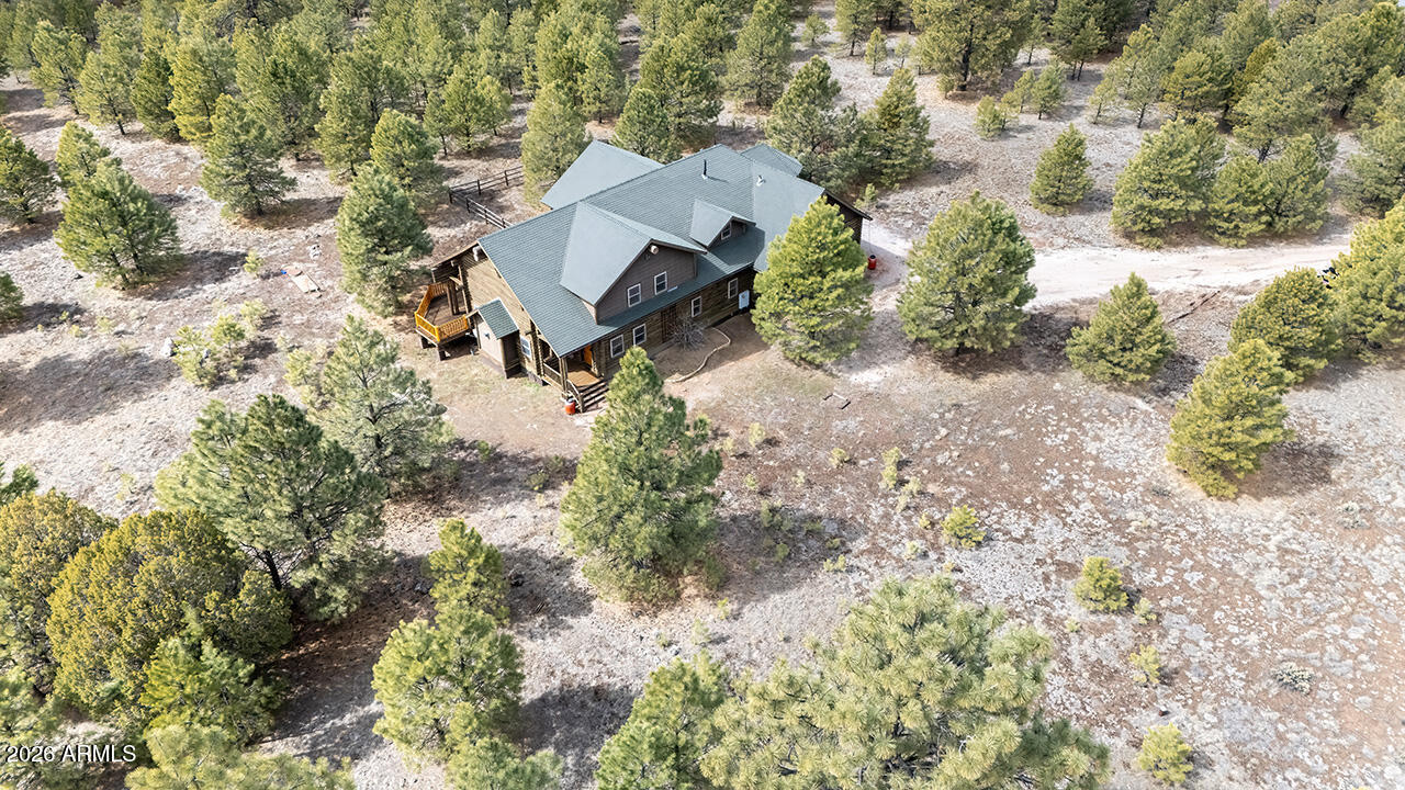 13090 Ghost Train Trail Parks, AZ 86046 - Photo 3 of 23 a view of a house with a yard