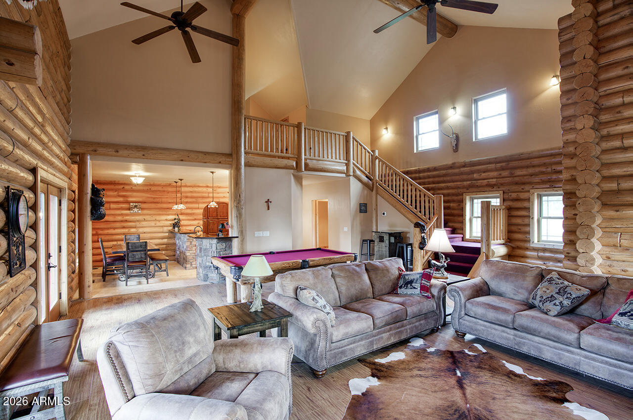 13090 Ghost Train Trail Parks, AZ 86046 - Photo 5 of 23 a living room with furniture and a large window