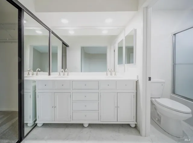 a bathroom with a sink and a toilet