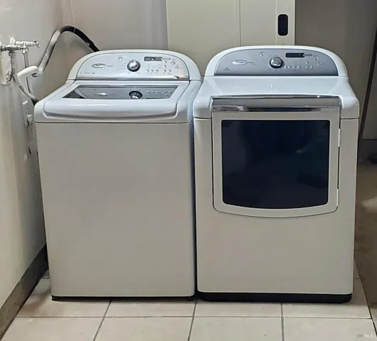 a utility room with dryer and washer