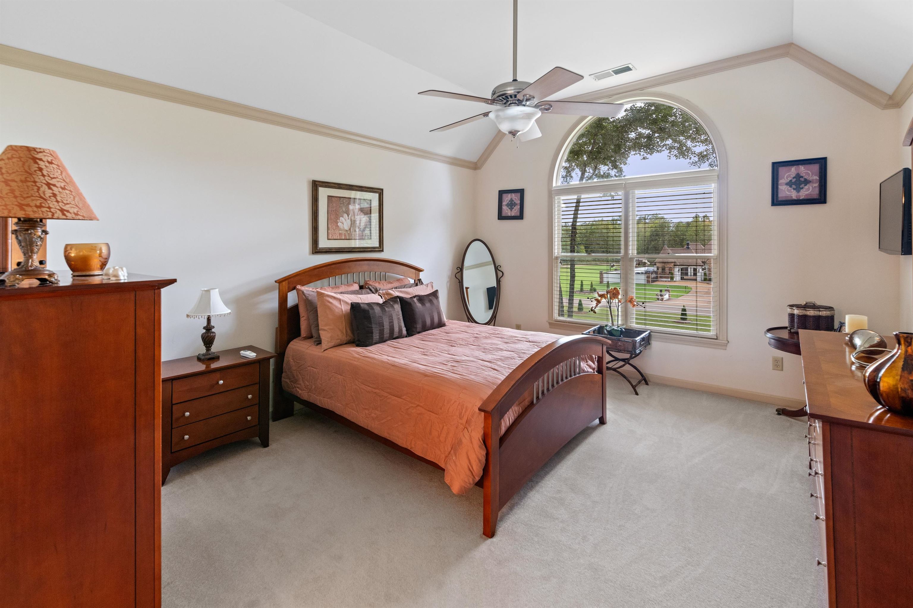 11241 Latting Road Eads, TN 38028 - Photo 30 of 31 a bedroom with a bed and a chandelier