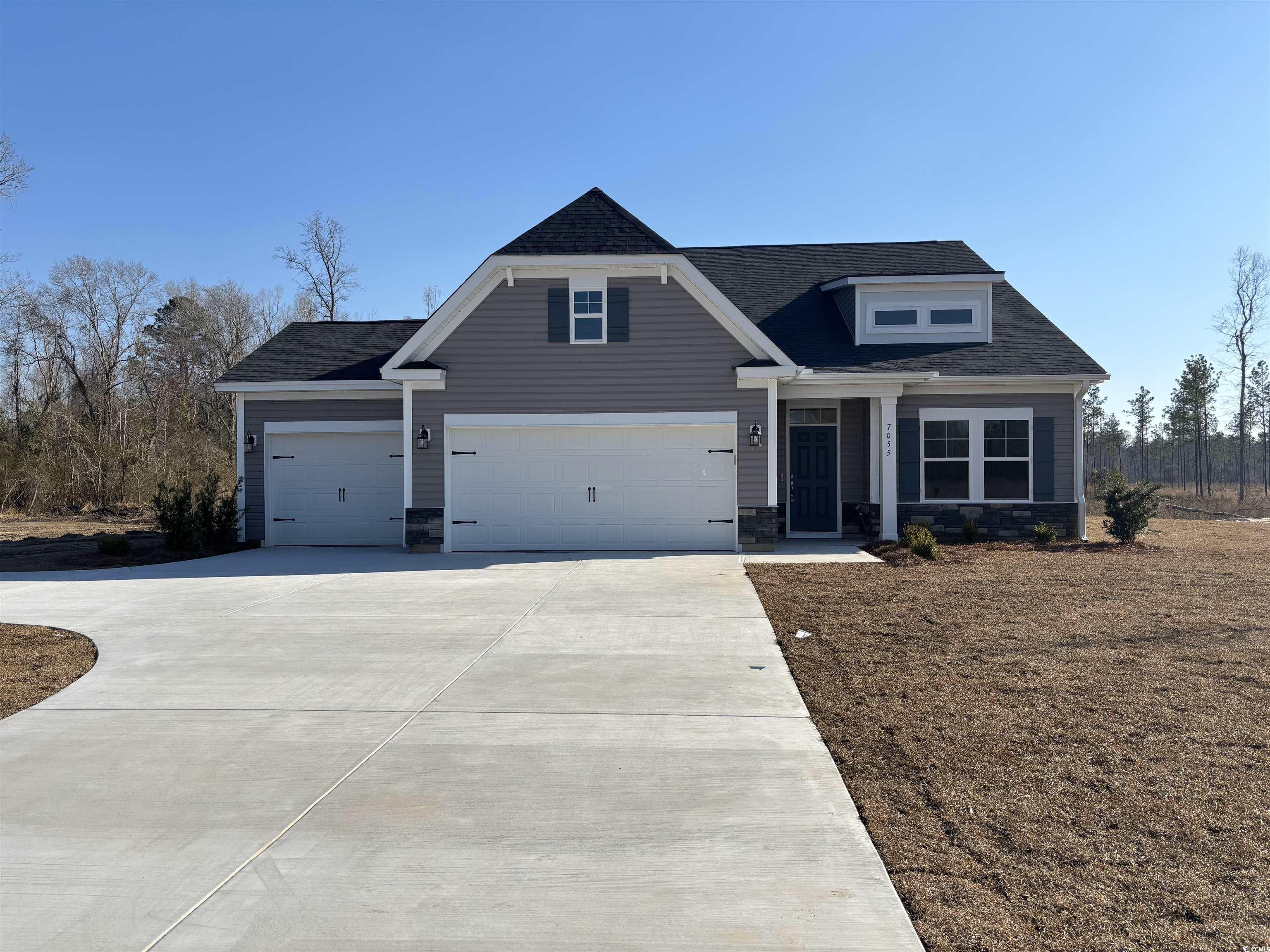 7055 Shady Grove Road Conway, SC 29527 - Photo 1 of 15 Craftsman inspired home featuring stone siding, dr