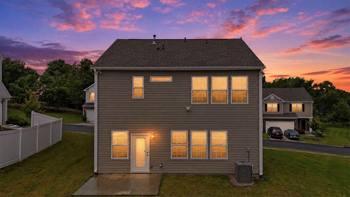 365 Sliding Rock Drive Pendleton, SC 29670 - Photo 33 of 46 A striking sunset frames this home's private yard, perfect for tranquil evenings.