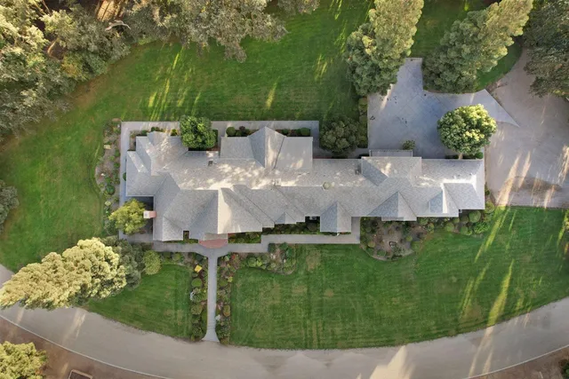 a view of a house with a big yard