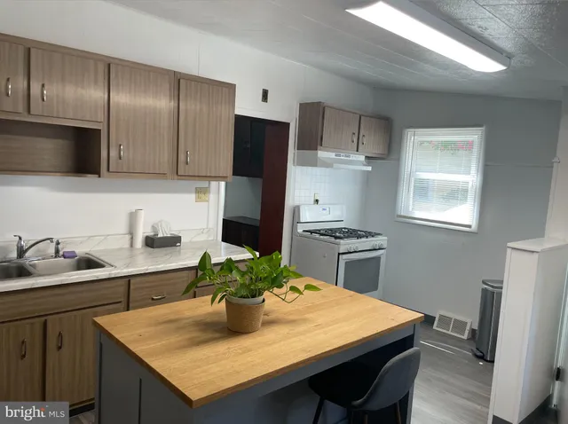 a room with a table and chairs