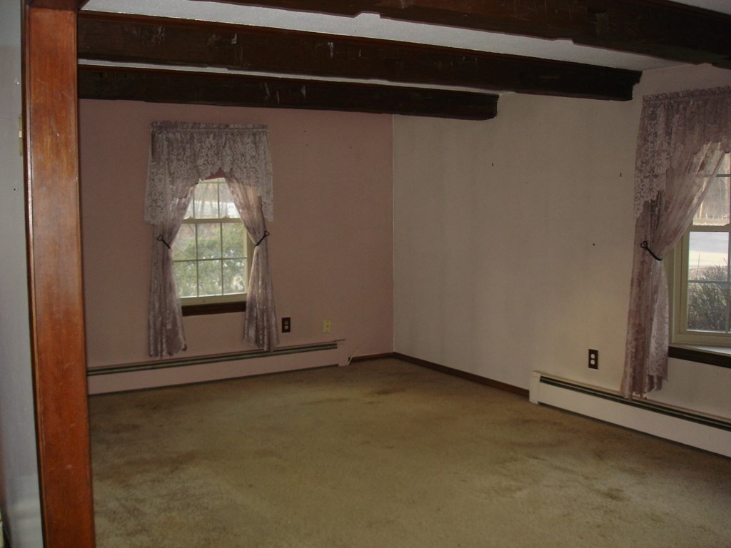 1033 Turnpike Road Ashby, MA 01431 - Photo 4 of 12 a view of empty room with window
