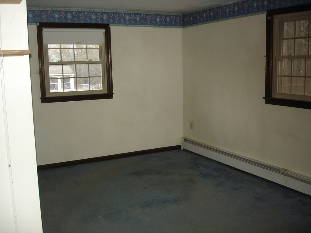1033 Turnpike Road Ashby, MA 01431 - Photo 6 of 12 an empty room with windows