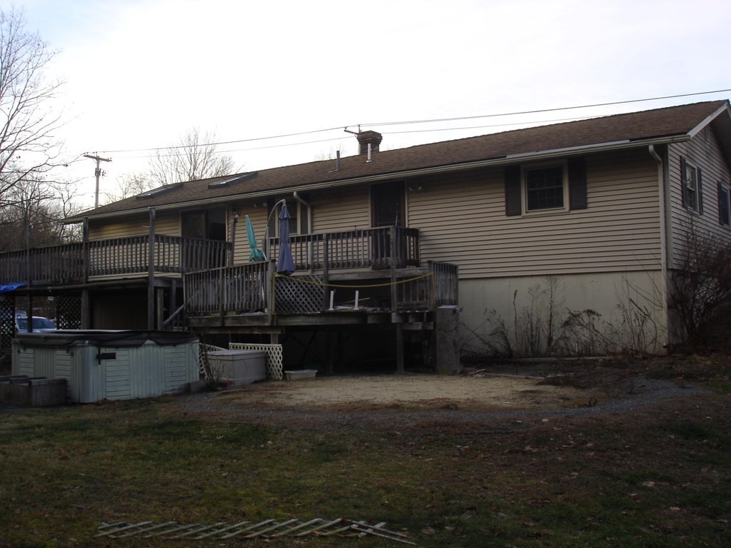 1033 Turnpike Road Ashby, MA 01431 - Photo 10 of 12 a backyard of a house