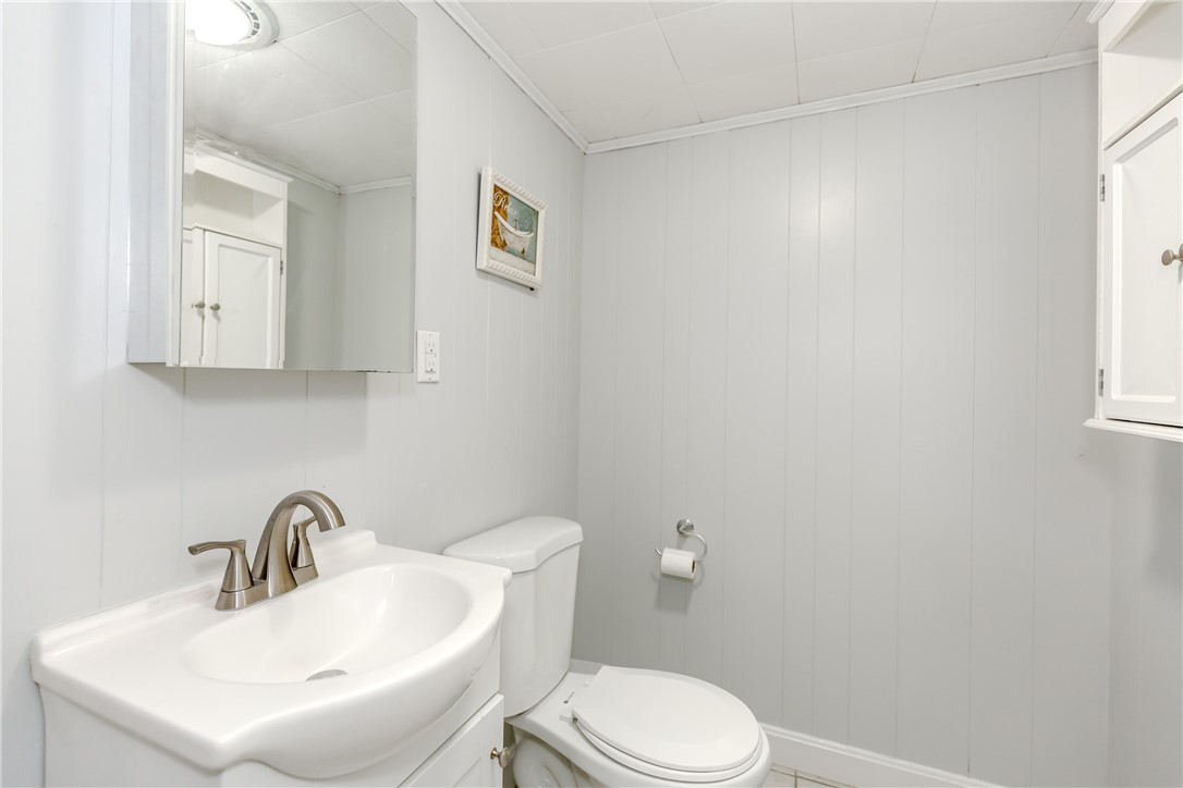 45 Dover Street Pawtucket, RI 02860 - Photo 27 of 36 Half bath off the family room for added convenience