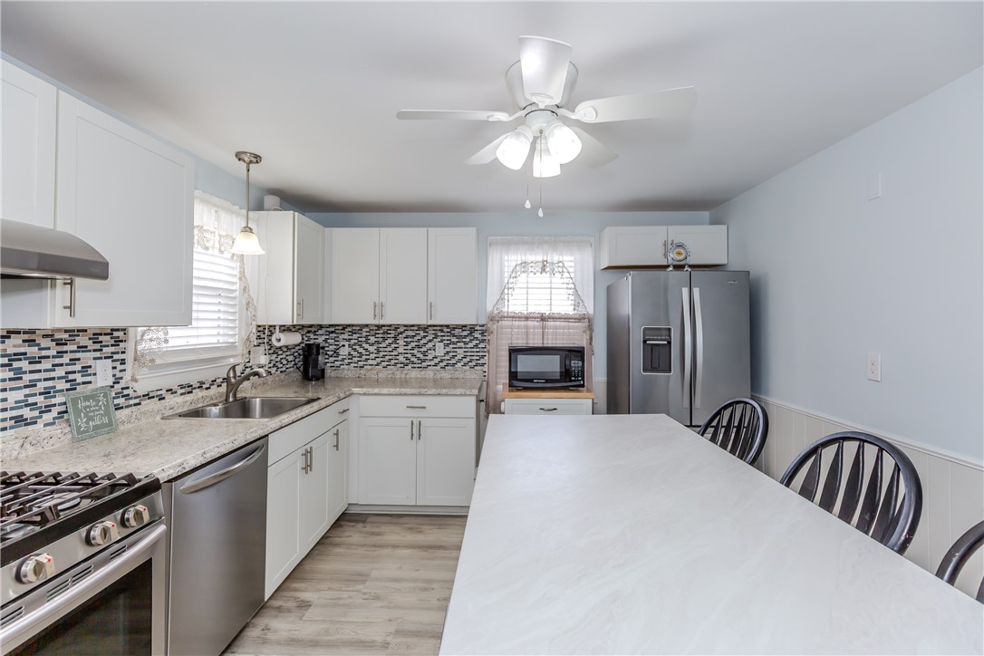 45 Dover Street Pawtucket, RI 02860 - Photo 5 of 36 Large island is a great work space and family dining