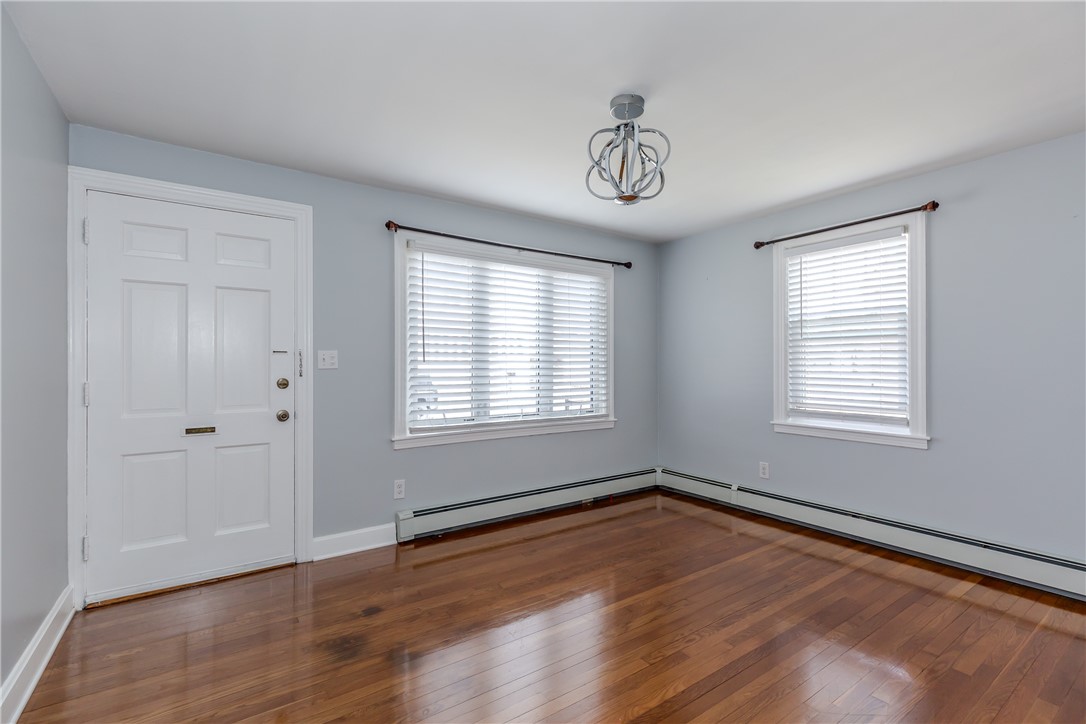 45 Dover Street Pawtucket, RI 02860 - Photo 7 of 36 Living room with gleaming hardwood floors!
