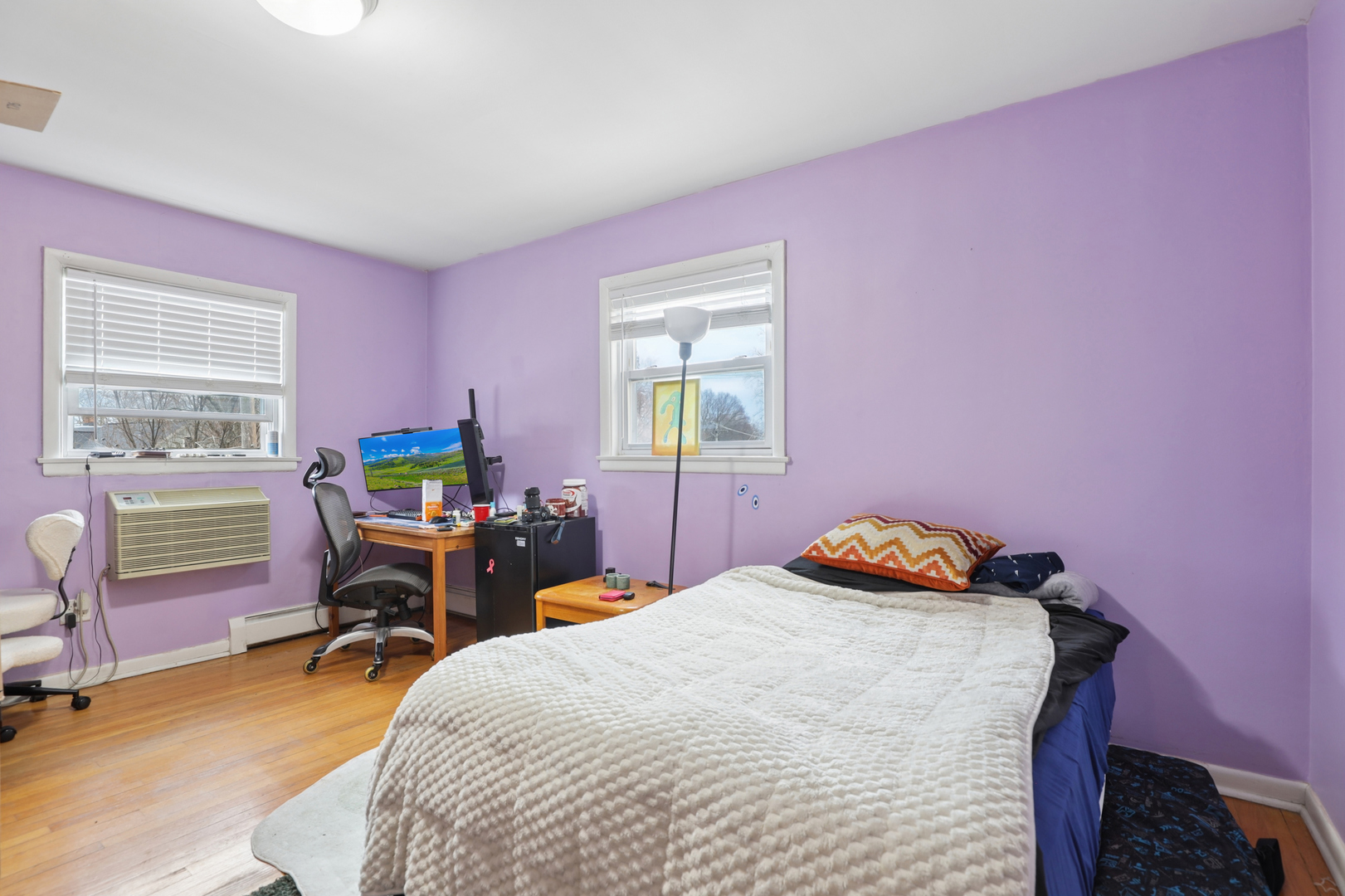 2147 Ridge Avenue, Unit 2D Evanston, IL 60201 - Photo 13 of 22 a bedroom with a bed and a desk in it