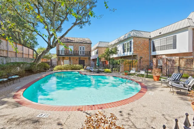 a view of a house with swimming pool