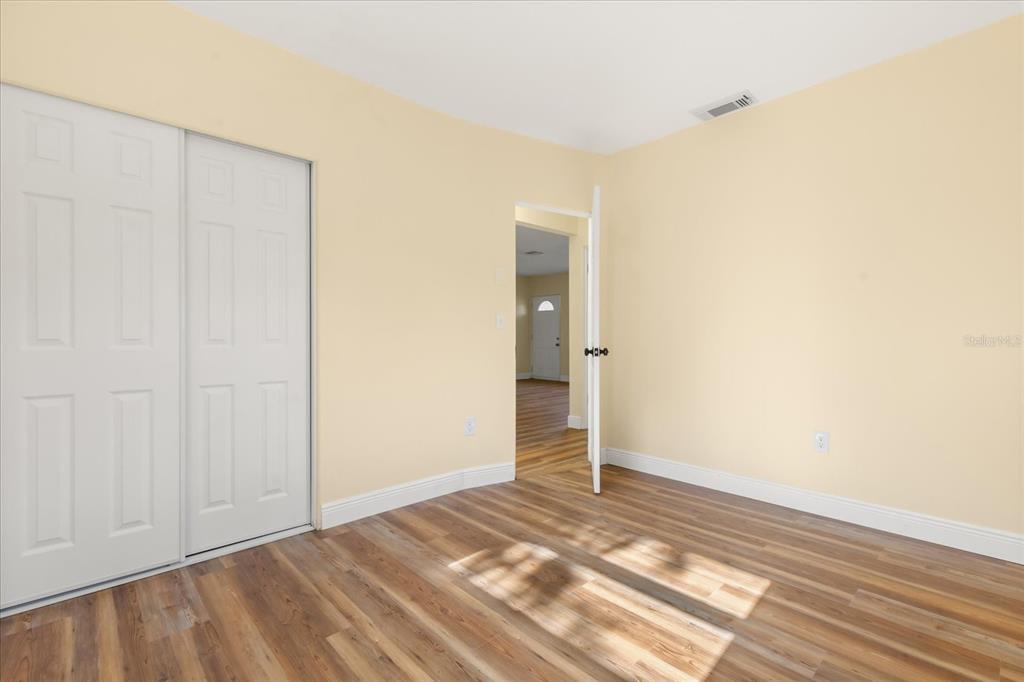 12432 136th Lane Largo, FL 33774 - Photo 13 of 24 a view of an empty room