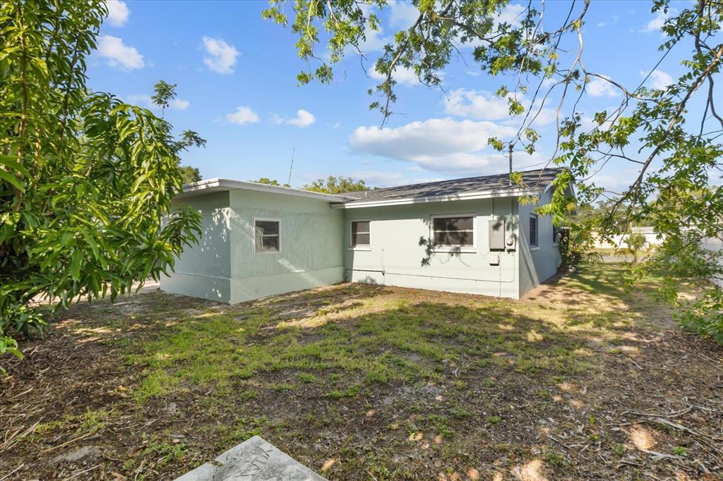 12432 136th Lane Largo, FL 33774 - Photo 23 of 24 a view of a house with a garage