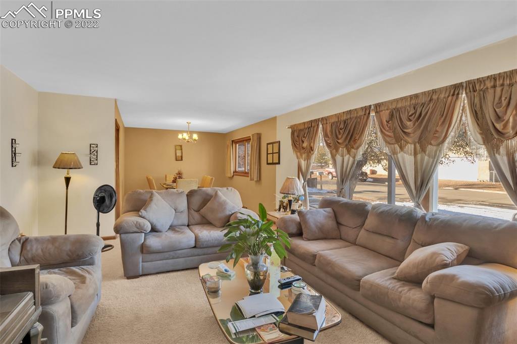 104 Dewey Road Canon City, CO 81212 - Photo 3 of 12 a living room with furniture and a large window