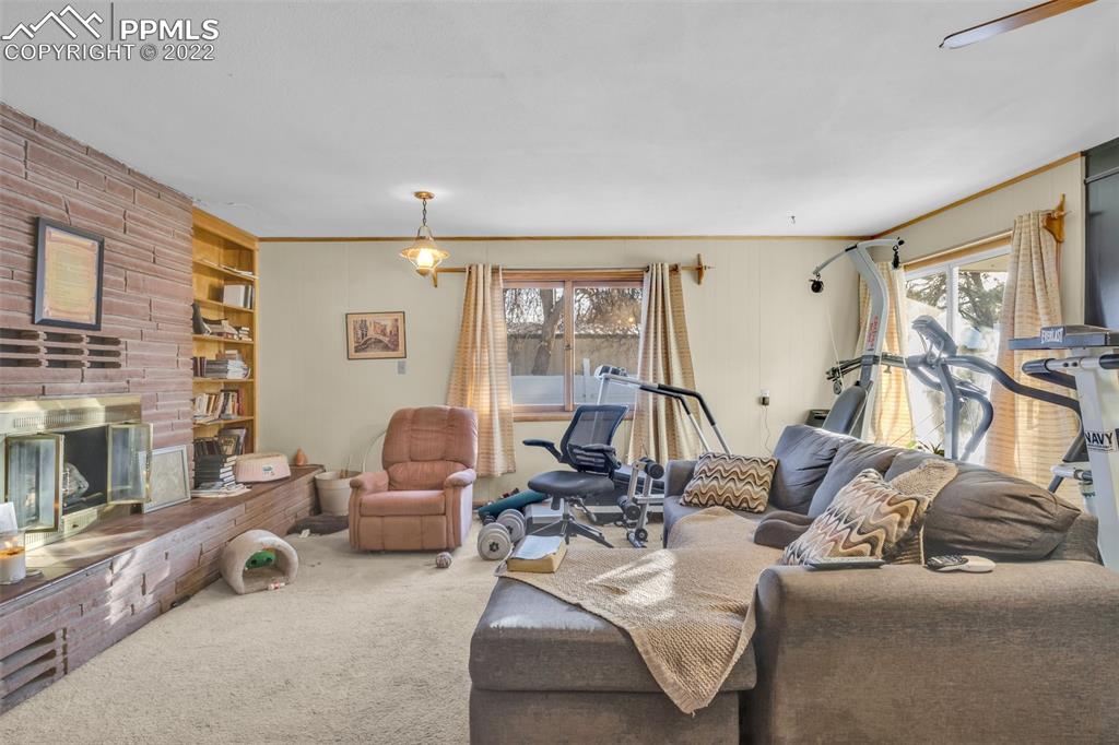 104 Dewey Road Canon City, CO 81212 - Photo 6 of 12 a room with gym equipment